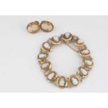 A contemporary shell cameo bracelet and earrings,