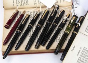 Nine vintage Parker fountain pens,