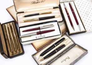 Five Parker pen sets,