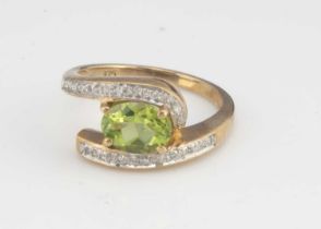 A modern 9ct gold and gem set ring,