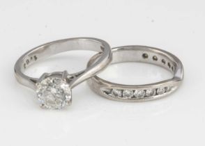 A certificated diamond solitaire ring,