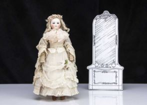 A French swivel headed fashionable doll,