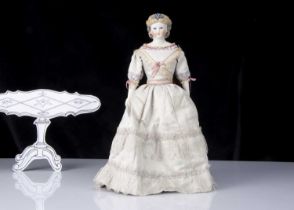 A rare Kling bisque shoulder-head doll with glass eyes and sculpted dress edge,