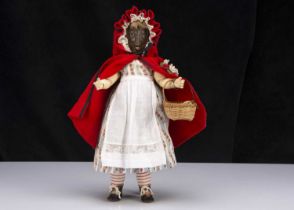 A very rare Bergner bisque three-faced Little Red Riding Hood doll,