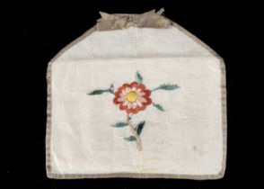 A 18th century embroidered silk envelope,