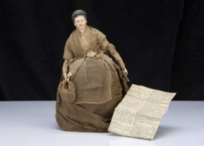 A mid 19th century German papier-mache shoulder-head lady doll,