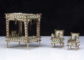 An unusual glass bead and twig dolls’ house four-poster bed,