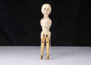 An 18th century English wooden doll,
