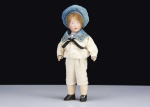 A rare German bisque headed character boy marked K,