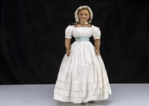 An early 19th century Bazzoni type dipped wax over papier-mache shoulder-head doll,