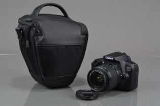 A Canon EOS 1300D DSLR Camera,