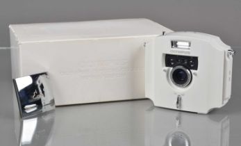 An Olympus Ecru 35mm Camera,
