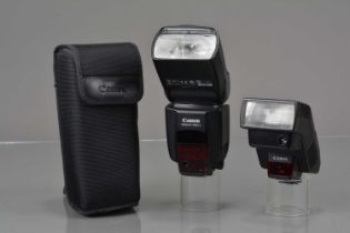 Two Canon Flash Units,