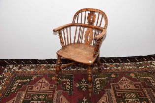 A nice antique mixed wood Windsor style chair,