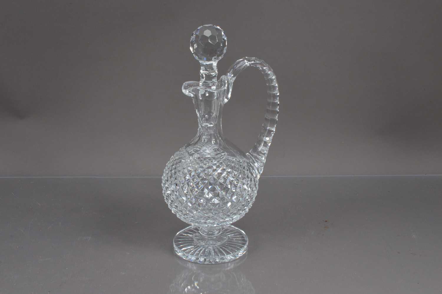 A Waterford crystal claret jug and stopper,