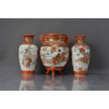 A pair of c1930s Japanese Kutani porcelain vases and a similar twin handled pot,
