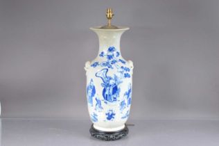 An early 20th century Chinese blue and white porcelain vase now converted to a lamp base,