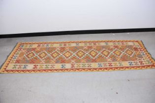 A mid 20th century Middle Eastern flat weave Kilim runner carpet,