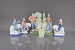 Five modern Rye Pottery figurines and a Sowerby style glass vase,