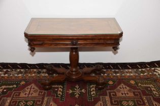 A Victorian walnut and ebony inlaid card table,