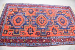 A mid 20th century Middle Eastern woollen carpet,