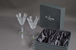 A boxed pair of Waterford crystal wine goblets in "Maeve" patter,