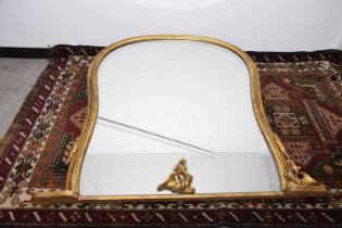 A large over mantle gilt mirror,