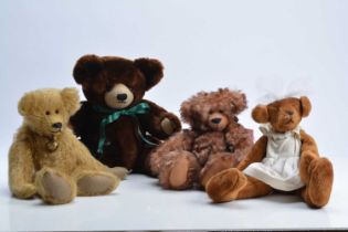 Four artist teddy bears,