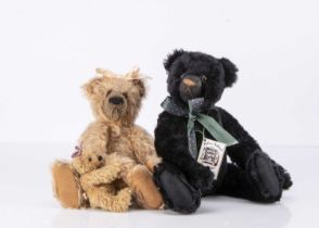 Two artist teddy bears,