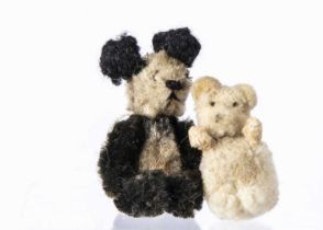 A post war miniature Schuco Panda teddy bear,