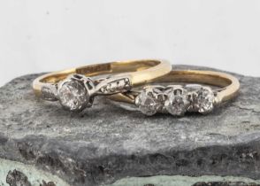 Two 18ct gold and platinum set dress rings,