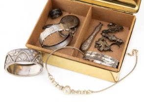 A small collection of silver and white metal jewels,