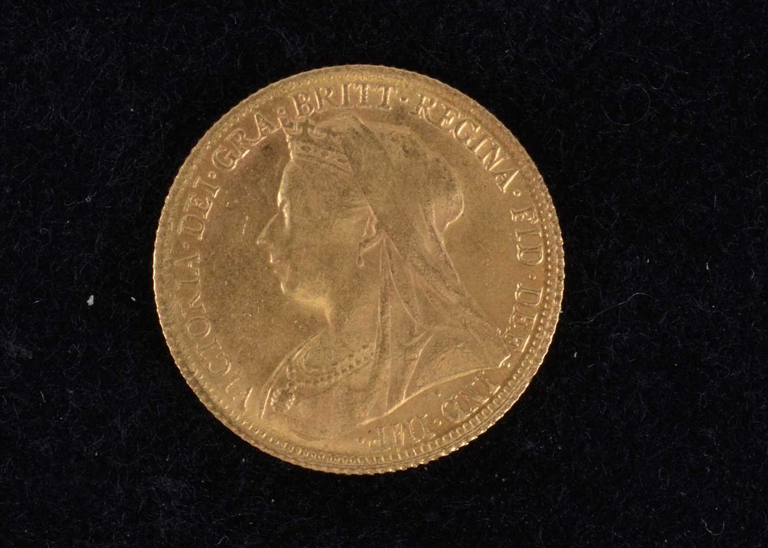 A Victoria style gold coin,