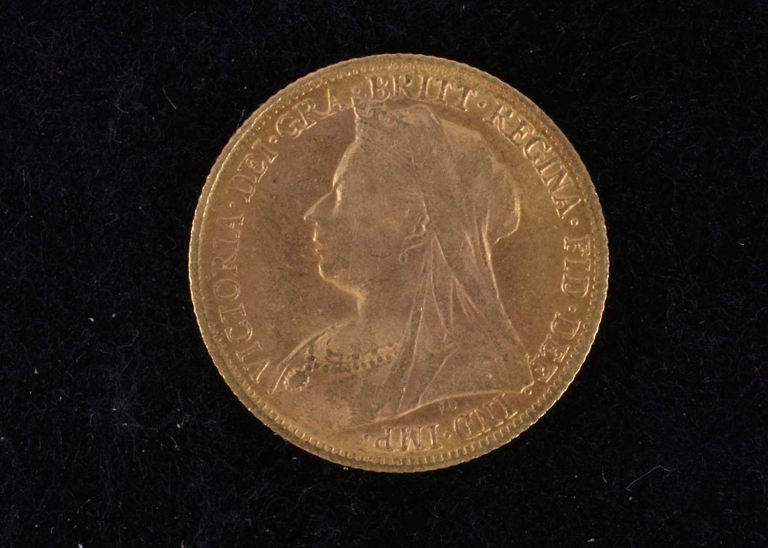 A Victoria style gold coin,