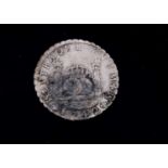 An 18th century Spanish Empire 8 Reales Style white metal coin,