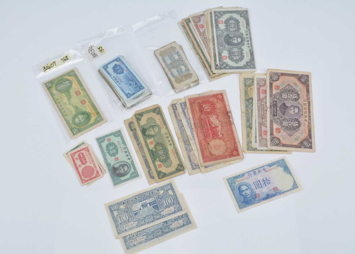 A collection of Chinese banknotes,