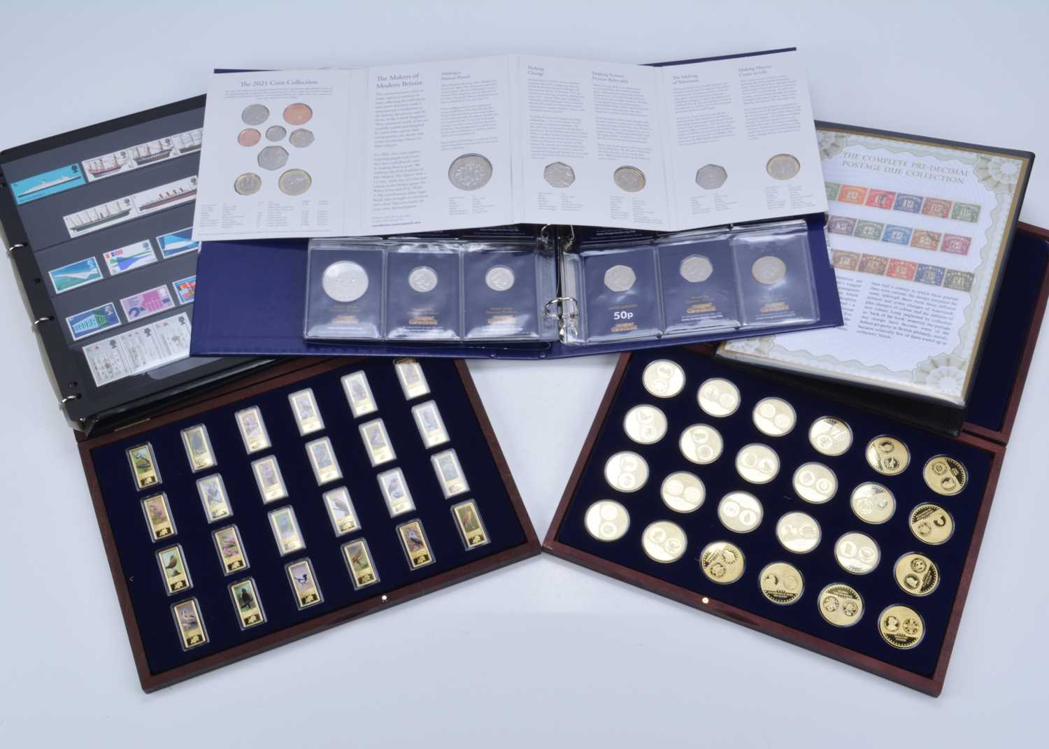 A collection of British uncirculated and proof coins and medallions,