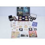 A collection of British Proof Coins and medallions,