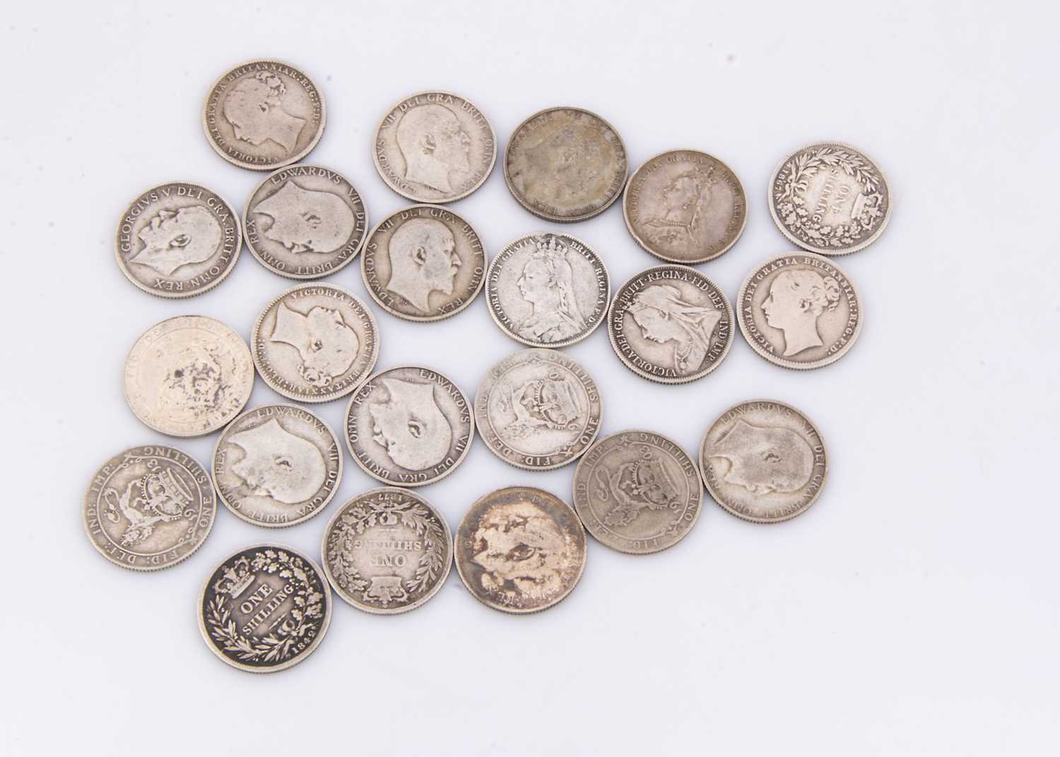 A collection of twenty two pre 1947 British shillings,