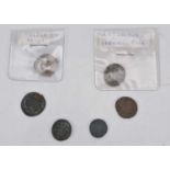 A collection of six Roman coins,