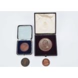 A collection of four 19th and 20th century Bronze medallions,