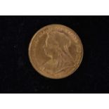 A Victoria style gold coin,