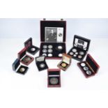 A collection of seventeen Silver Proof crown size coins,