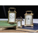Three brass carriage clock timepieces,