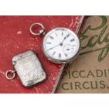 A Victorian silver open faced pocket watch and a vesta case,