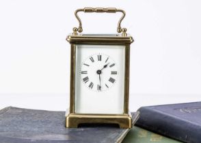 A late Victorian brass carriage timepiece,