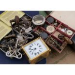 A collection of clock and watch spare parts and related items,