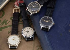 Four Smiths wristwatches,