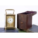 A late Victorian brass carriage repeater timepiece,