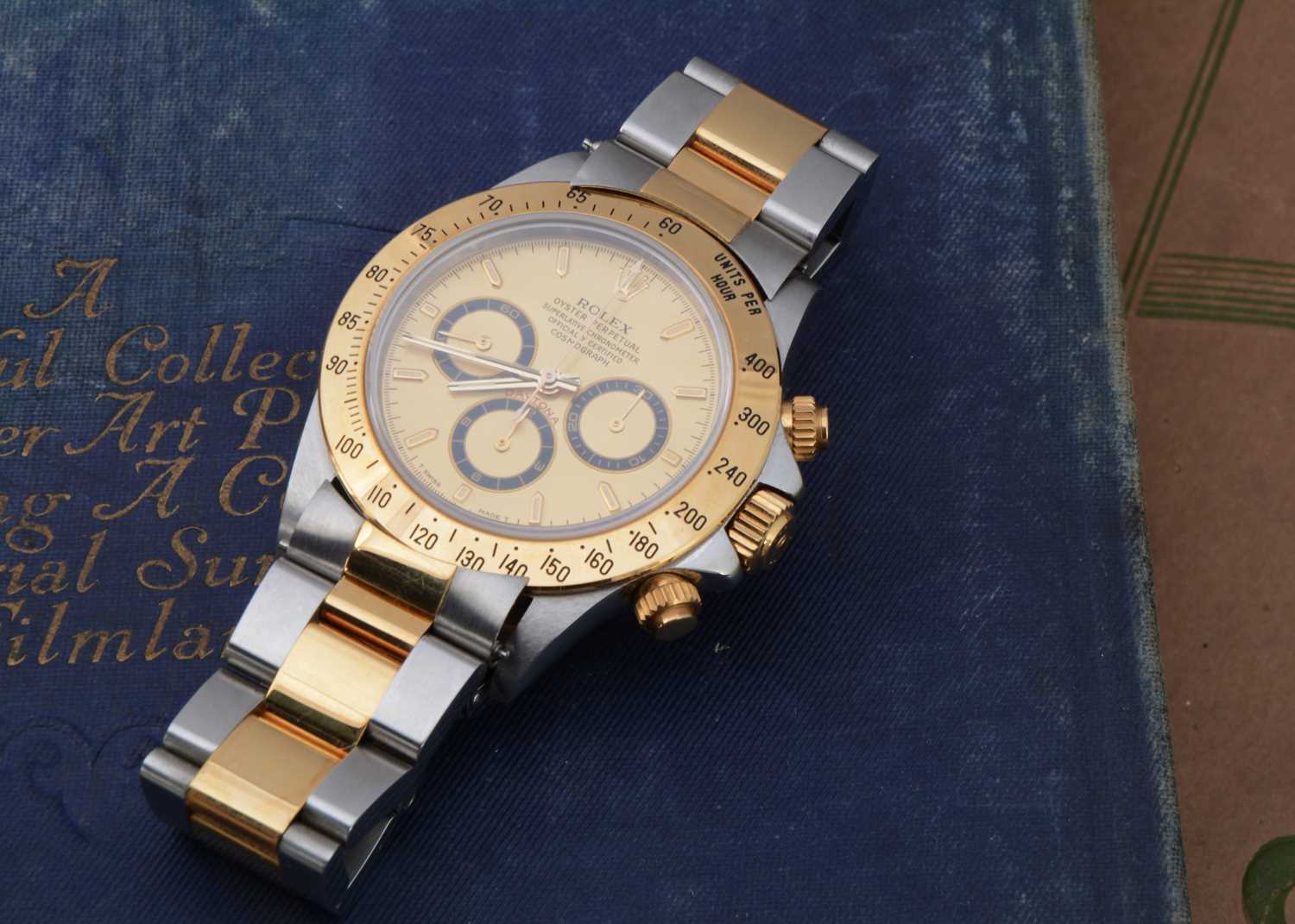 A 1990s Rolex Oyster Perpetual Daytona stainless steel and 18ct gold wristwatch full set,